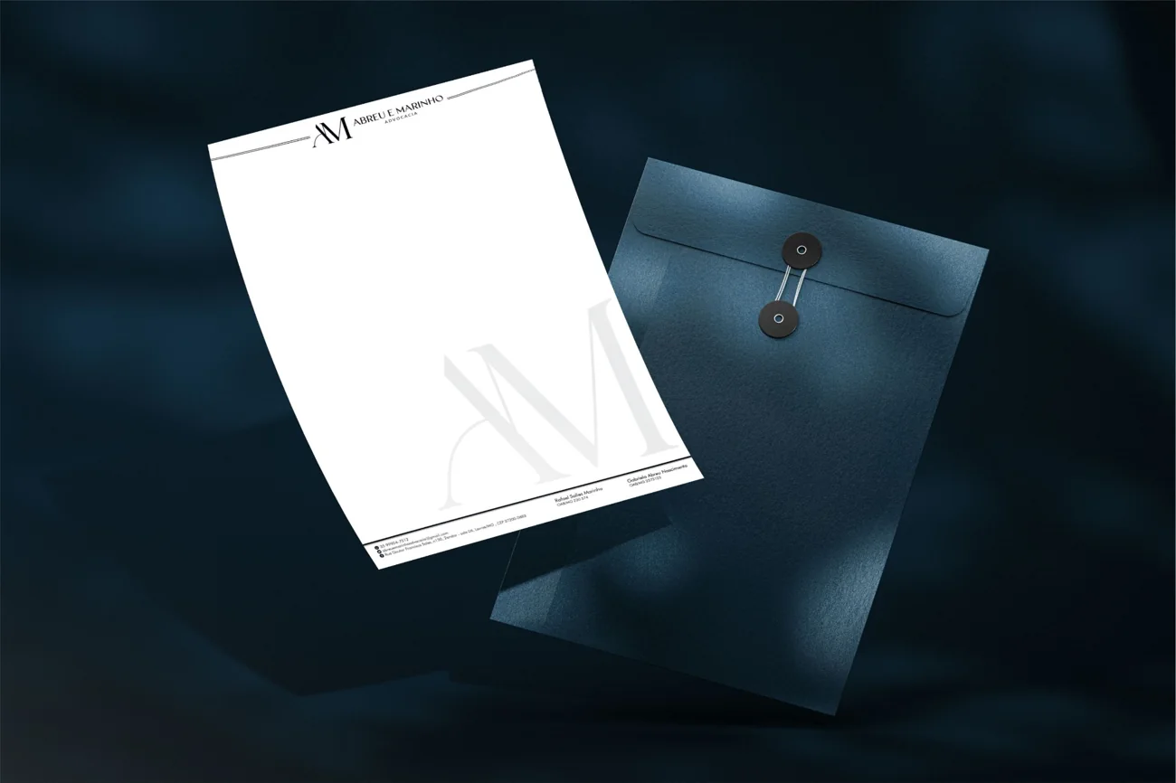 Aplicações da identidade institucional em papel timbrado e envelope